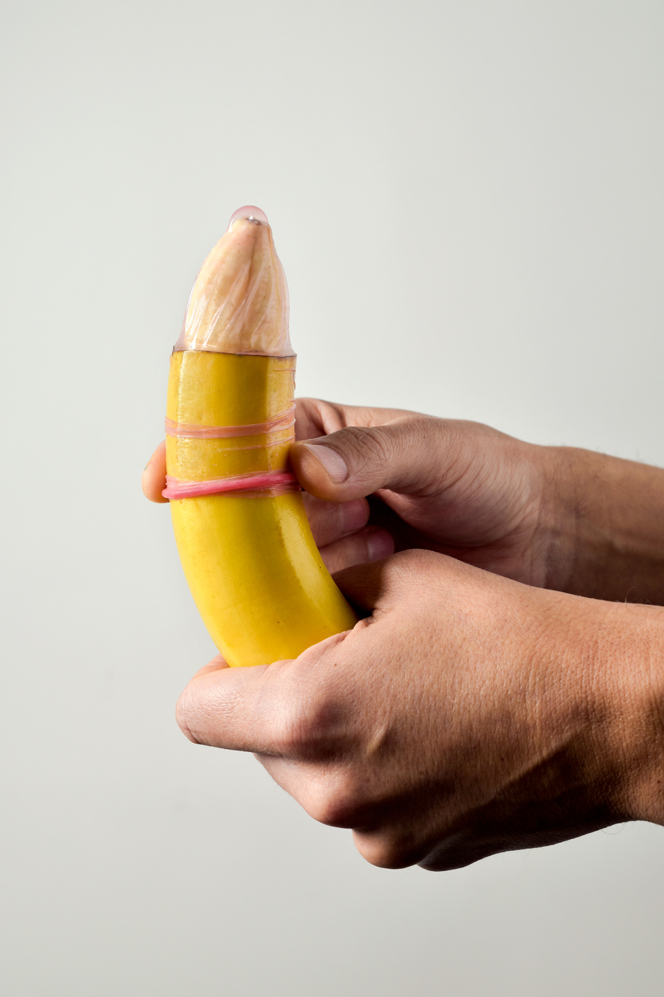 Slipping a Condom over a Banana